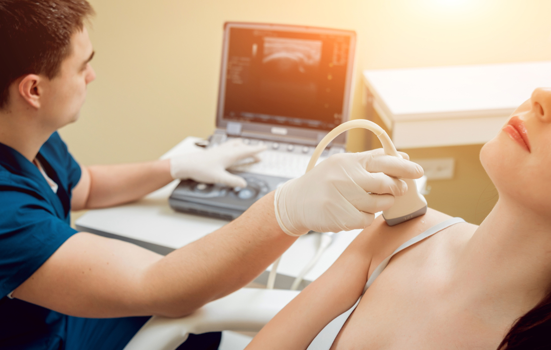 Patient with orthopedist doctor in his office. Knee sonography.